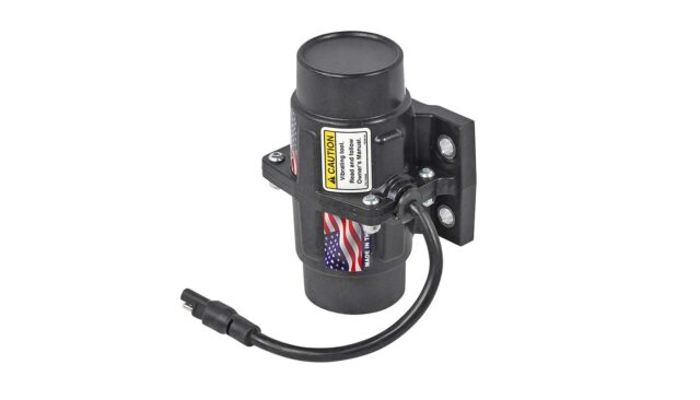 vibrator for spreader material flow